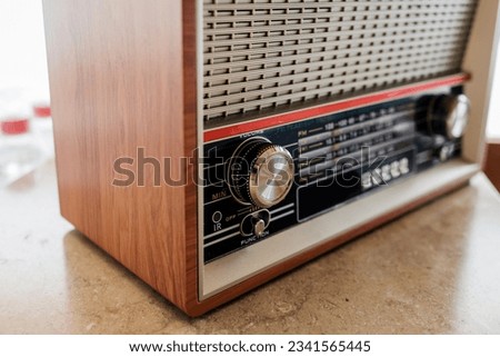 grungy retro radio. Wooden antique radio Royalty-Free Stock Photo #2341565445