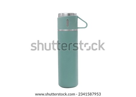 vacuum insulated water bottle  portable thermos for hot and cold drinks for travel and hiking. green color vacuum insulated thermos.  Royalty-Free Stock Photo #2341587953