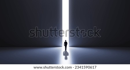 Back view of male silhouette in abstract concrete interior with line opening in wall, shadow and mock up place. Success, financial growth and future concept Royalty-Free Stock Photo #2341590617
