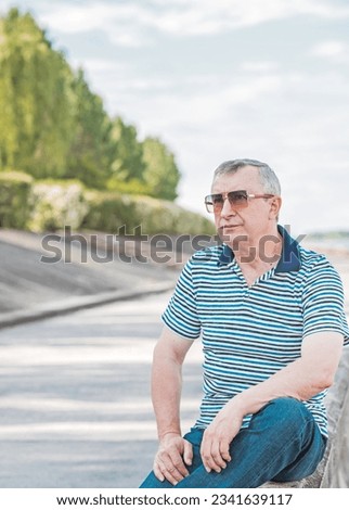 Lifestyle of mature man 55s-60s, real photos from life. Older men outdoor psychology portrait