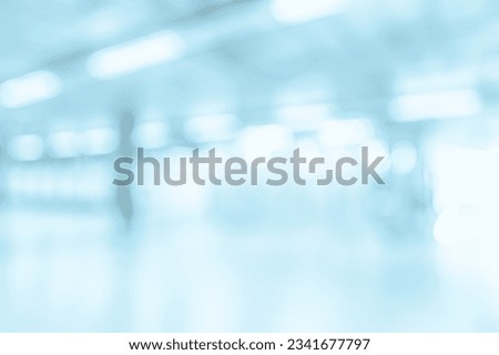 BLURRED OFFICE BACKGROUND, LIGHT ILLUMINATED BUSINESS HALL, MODERN MEDICAL SPACIOUS INTERIOR Royalty-Free Stock Photo #2341677797