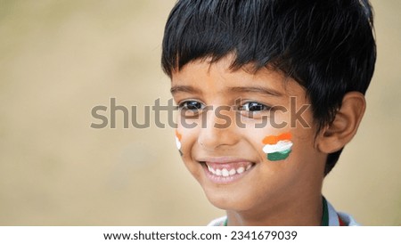 Little boy holding tricolor flag on the occasion of Vijay Diwas Royalty-Free Stock Photo #2341679039