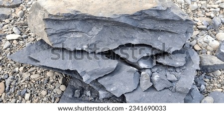 photo of river rock texture that has been solved.