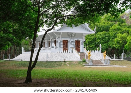 Architecture located within the temple grounds Surrounded by lawns and forests.