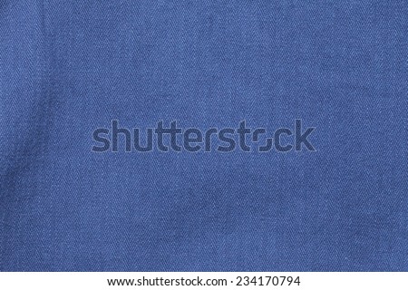 Close up photo of blue color filtered herringbone patterned fabric style represent the applied synthetic cloth production.  