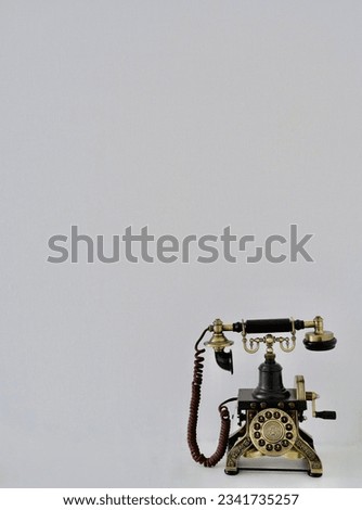 retro telephone on a light gray background with a place for an inscription