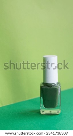 Green nail polish with fresh and playful green background