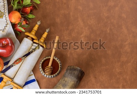 Jewish New Year holiday Rosh Hashanah religious tradition attributes symbols festival with honey apples pomegranate Royalty-Free Stock Photo #2341753701