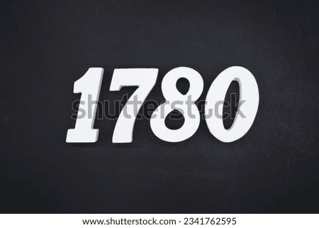 Black for the background. The number 1780 is made of white painted wood.