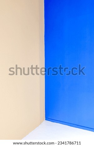 photo of a corner of a room with various colors for the background
