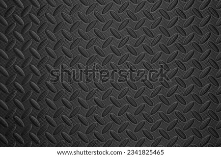 Tough durable black industrial background macro close up view Royalty-Free Stock Photo #2341825465