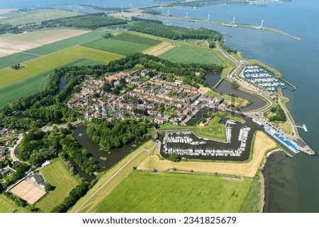 Aerial view of the fortified city of Willemstad, Moerdijk in the Province of Noord-Brabant, Netherlands. Star fortifications were developed in the late fifteenth centuries. Royalty-Free Stock Photo #2341825679