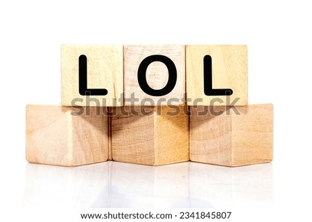 LOL. Cubes form the word LOL. Concept LOL - laughing out loud Royalty-Free Stock Photo #2341845807