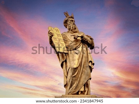 Statue, Moses with the Ten Commandments in Gold. Royalty-Free Stock Photo #2341847945