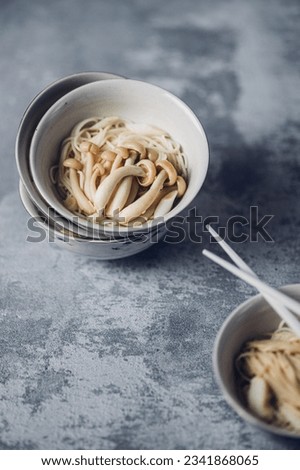 food picture of asian cuisine with noodles and mushrooms