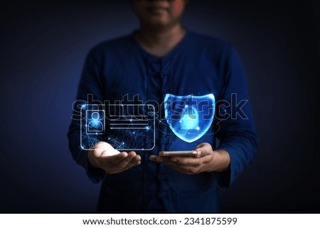 Businessman showing digital identity card and security shield icon. internet and security data safe concept.