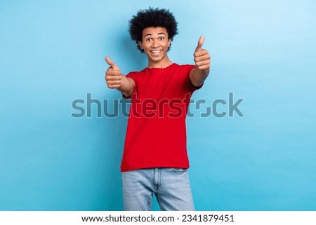 Photo portrait of funny curly hair youngster guy raise thumb fingers up agreement appointment isolated blue color background