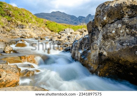 A mountain streem flowing very fast texture design picture