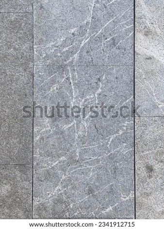 Footpath on marble slabs with beautiful grain