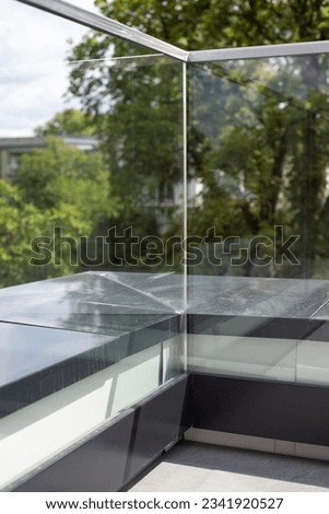 rooftop terrace with glass balcony balustrade
