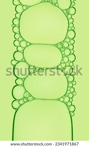 Cosmetic water or green fragrance texture with bubbles