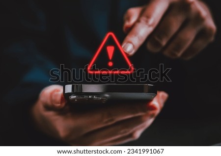 People with warning notification and spam message icon on mobile phone Royalty-Free Stock Photo #2341991067