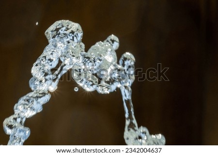 Micro shot of a stream of water coming out of a fountain in Mankato Minnesota