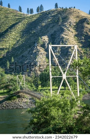 A Bridge in Idaho, United States, above the Salmon River surrounded by mountains