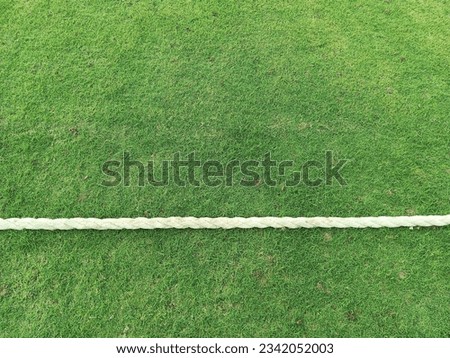 The rope of boundary line at a stadium pitch 