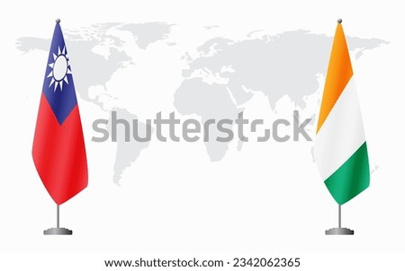 Taiwan and Ivory Coast flags for official meeting against background of world map.