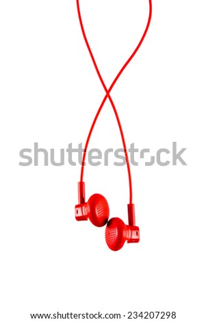 Close up on red earbuds isolated on white background
