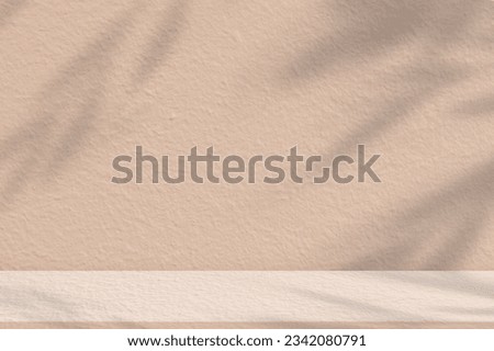 Studio background,Concrete wall with Leaves shadow and sunlight on beige background,Empty Cement Studio Room Display with Podium,Backdrop display for Autumn, Fall product presentation