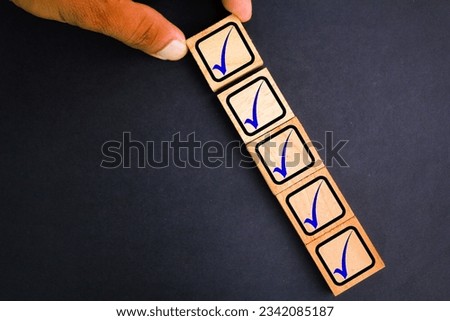 wooden cube with right sign icon line. Right sign concept. certified and correct mark. Standard certification, accurate selection, production standards and good quality. Check mark concept