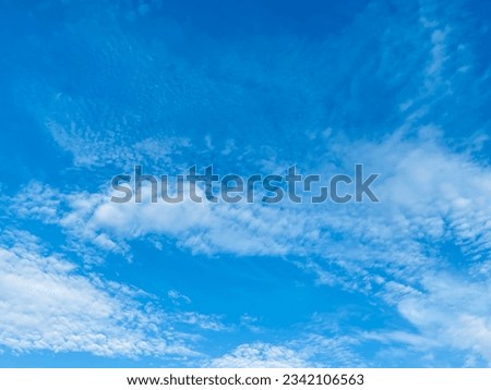Blue sky slightly white cloud. Beautiful sky. Royalty-Free Stock Photo #2342106563