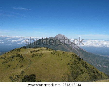Mount Merapi seen from Sabana 2 Mount Merbabu. The photo was taken by Willem Tasiam, a marathon climber