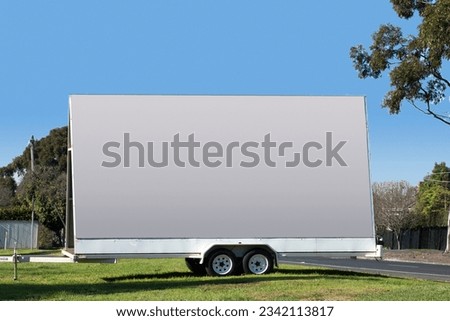 BILLBOARD ADVERTISING SIGN - A mobile trailer with a blank empty outdoor mural, billboard signage board to display your own message, words or advert promoting your business