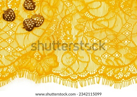 High quality royal yellow lace patch for haute couture models. The perfect accessory to enhance your fashion collection. The unique texture and pattern add a touch of sophistication.