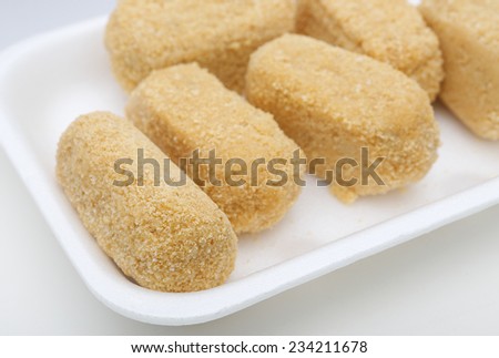 Cod croquettes on white background