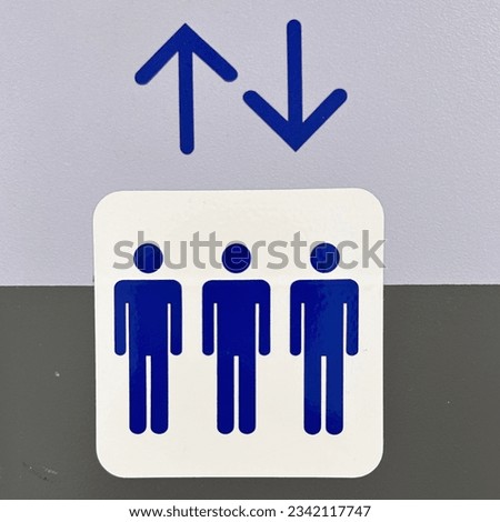 Blue and White Icon sign for Elevator