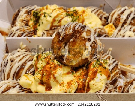 Teritama takoyaki served in box
