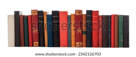 Books standing in a row isolated on white background.  Royalty-Free Stock Photo #2342126703