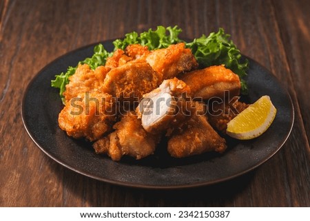 Japanese fried chicken on a plate Royalty-Free Stock Photo #2342150387