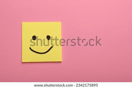 smiley face on a paper Royalty-Free Stock Photo #2342175895