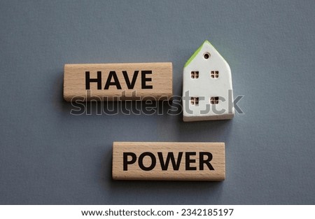 Have power symbol. Wooden blocks with words have power. Beautiful grey background. Business and have power concept. Copy space.