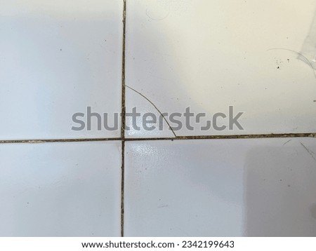 broken tile floors due to bad installation