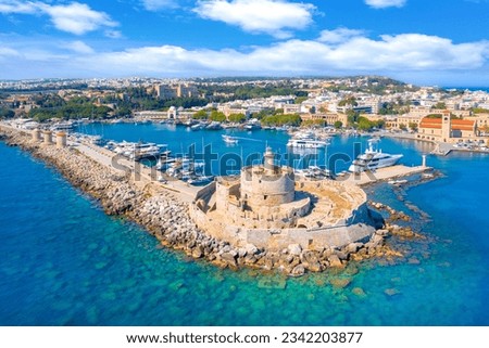 Mandraki port with fort of St. Nicholas and windmills, Rhodes, Greece.  Royalty-Free Stock Photo #2342203877