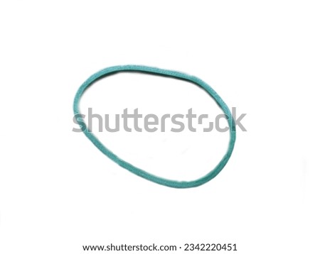 a green rubber band. isolated white background. 