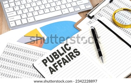 PUBLIC AFFAIRS text on paper on chart background