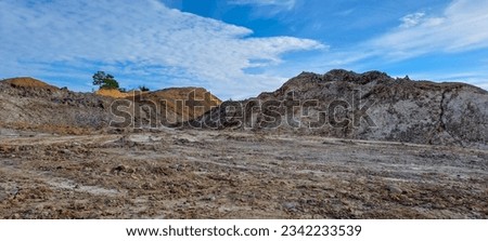 arid land left over from illegal coal mining excavations in Kalimantan, Indonesia Royalty-Free Stock Photo #2342233539