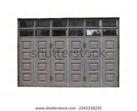 a photography of a garage door with a window and a fire hydrant, a close up of a garage door with a window and a fire hydrant.